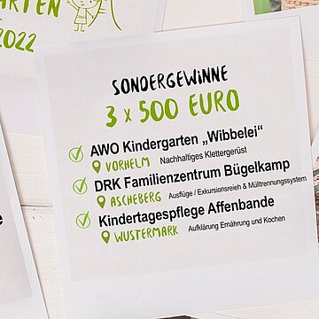 Aktion grüner Kindergarten 2022 Hinweis auf Sondergewinne für drei Kindergärten mit je 500 Euro.