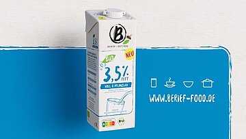 Berief wieder im TV Berief Getränkekarton von weiß-blauem Hintergrund.