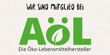 Ein Bild auf dem darauf hingewiesen wird, das Berief Mitglied der ökologischen Lebensmittelhersteller ist.