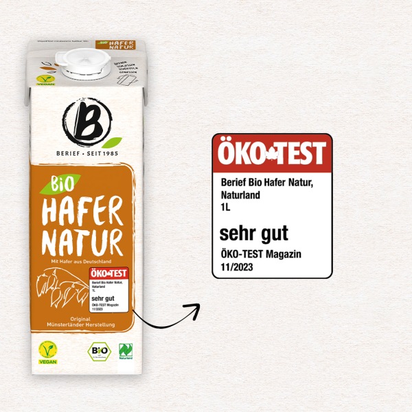 Getränkekarton Hafer Natur vor weißem Hintergrund mit Hinwreis auf "Ökotest sehr gut".